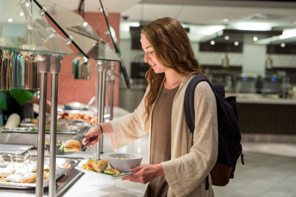 Student in dining facilitie