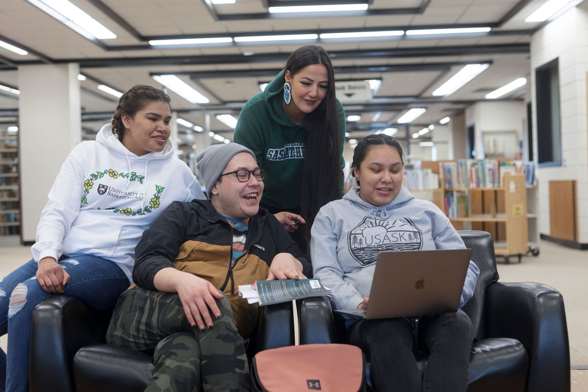 ITEP College of Education students in the library