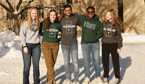 Students outside in the bowl in winter.
